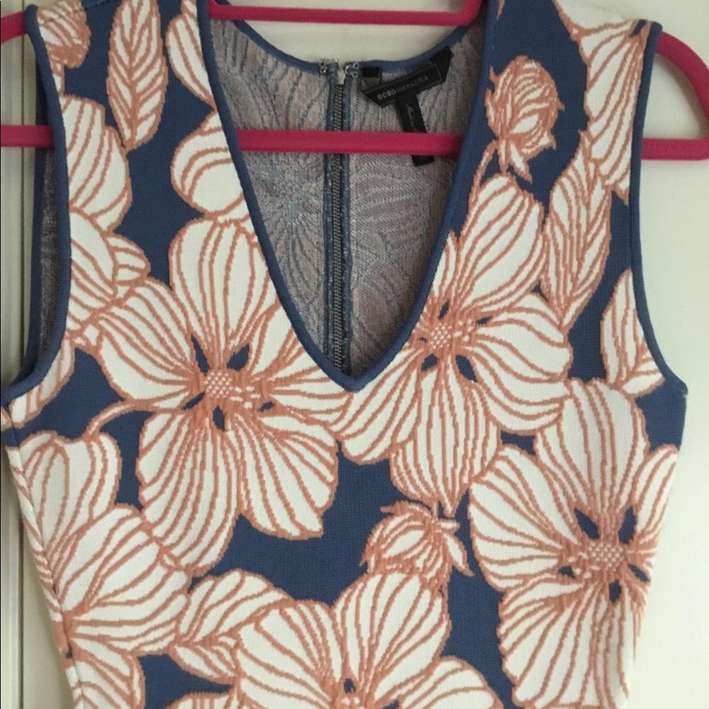 Sleeveless cocktail sweater dress. Lots of stretch.